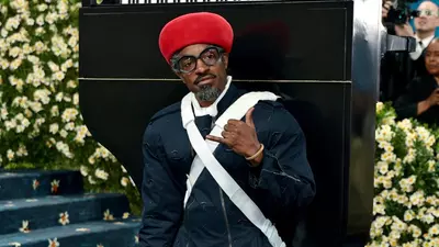 André 3000 Steals the Show at Met Gala 2025 with a Piano on His Back
