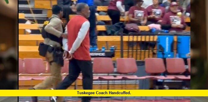 tuskegee coach handcuffed
